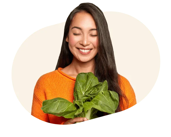 girl holding a salad