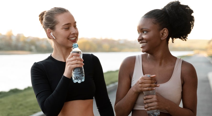 info smiling girls with water